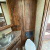 PRE-OWNED 2014 Logan Coach RAZ4GNHDLQ 40' 4 horse Razor GN Horse Trailer**WITH WALK IN CLOSET**