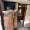 PRE-OWNED 2014 Logan Coach RAZ4GNHDLQ 40' 4 horse Razor GN Horse Trailer**WITH WALK IN CLOSET**