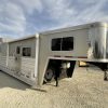 PRE-OWNED 2014 Logan Coach RAZ4GNHDLQ 40' 4 horse Razor GN Horse Trailer**WITH WALK IN CLOSET**
