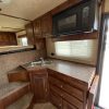 PRE-OWNED 2014 Logan Coach RAZ4GNHDLQ 40' 4 horse Razor GN Horse Trailer**WITH WALK IN CLOSET**