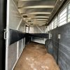PRE-OWNED 2014 Logan Coach RAZ4GNHDLQ 40' 4 horse Razor GN Horse Trailer**WITH WALK IN CLOSET**