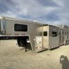 PRE-OWNED 2014 Logan Coach RAZ4GNHDLQ 40' 4 horse Razor GN Horse Trailer**WITH WALK IN CLOSET**