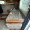 PRE-OWNED 2014 Logan Coach RAZ4GNHDLQ 40' 4 horse Razor GN Horse Trailer**WITH WALK IN CLOSET**