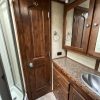 PRE-OWNED 2014 Logan Coach RAZ4GNHDLQ 40' 4 horse Razor GN Horse Trailer**WITH WALK IN CLOSET**