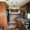 PRE-OWNED 2014 Logan Coach RAZ4GNHDLQ 40' 4 horse Razor GN Horse Trailer**WITH WALK IN CLOSET**