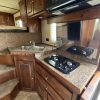 PRE-OWNED 2014 Logan Coach RAZ4GNHDLQ 40' 4 horse Razor GN Horse Trailer**WITH WALK IN CLOSET**